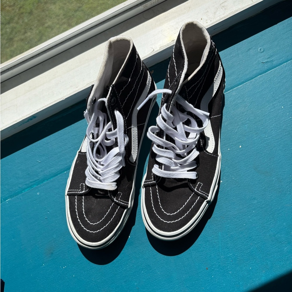 Vans Black and White High-Top Sneakers